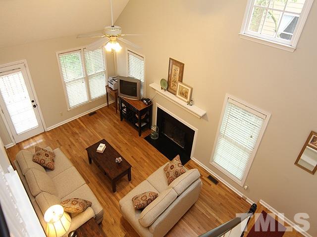4952 Royal Adelaide Way Raleigh, NC 27604 - Photo 5 of 25 Gleaming Hardwood Floors on main level except bathroom.