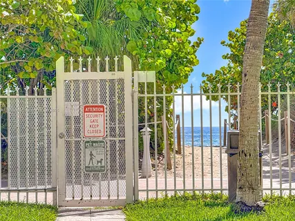 a sign on the side of the house