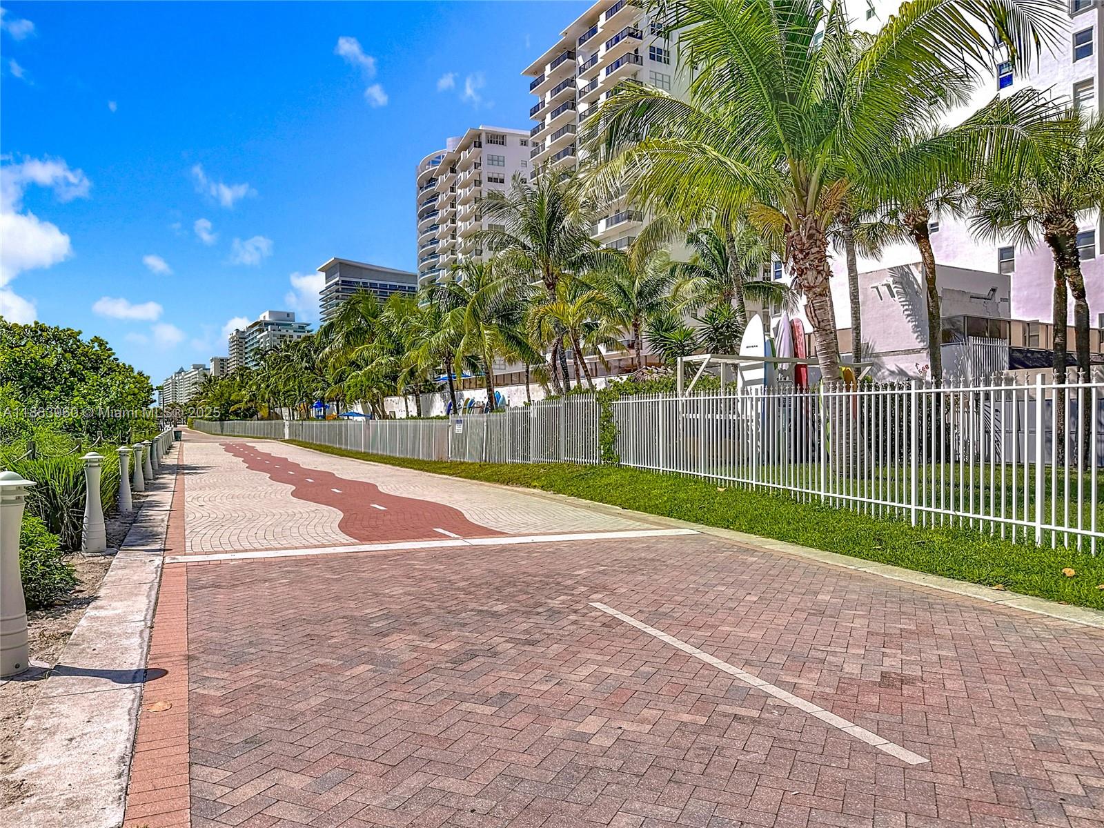 6061 Collins Avenue, Unit 20C Miami Beach, FL 33140 - Photo 25 of 29 a view of a backyard