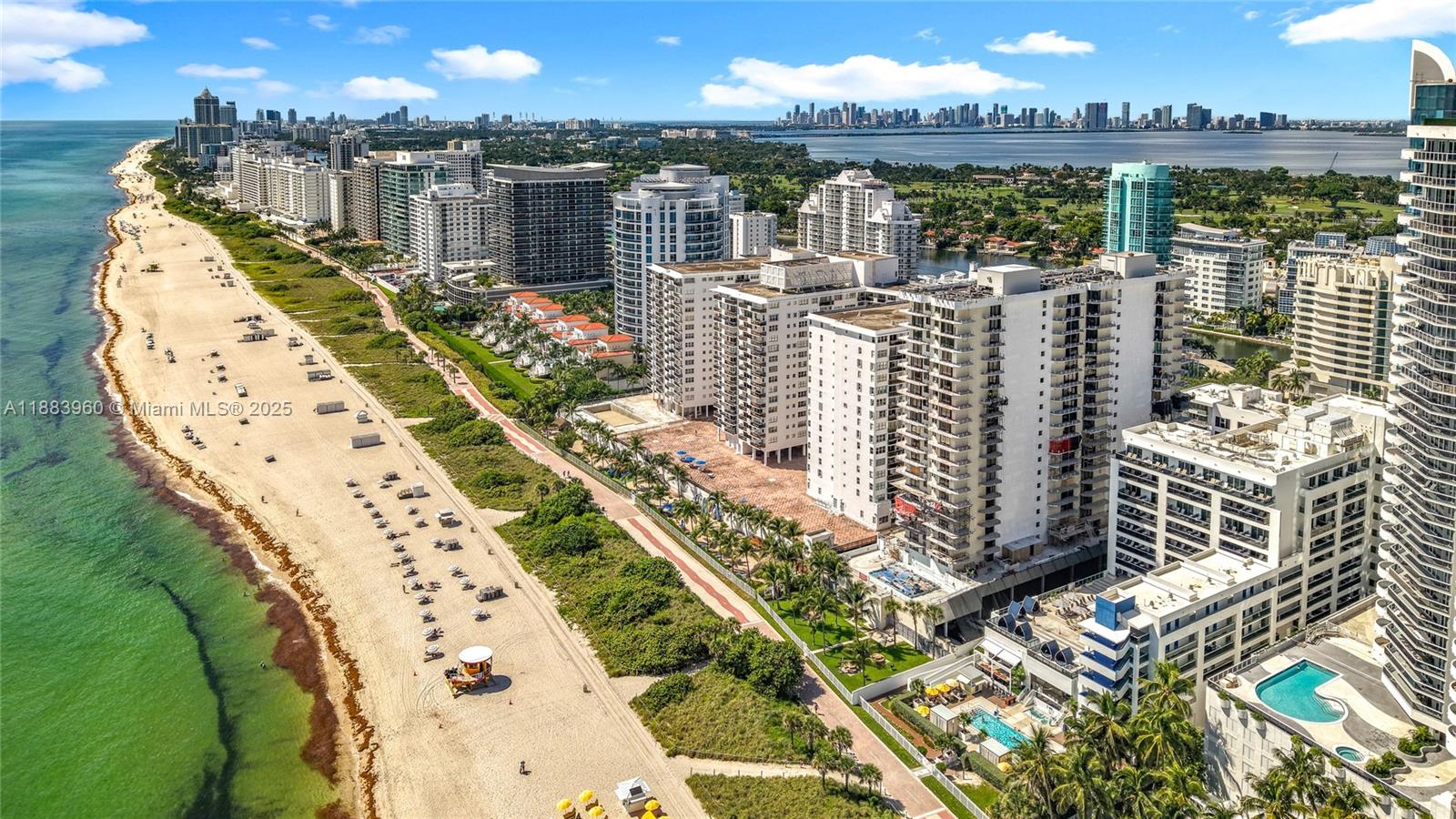 6061 Collins Avenue, Unit 20C Miami Beach, FL 33140 - Photo 27 of 29 a view of a balcony with city