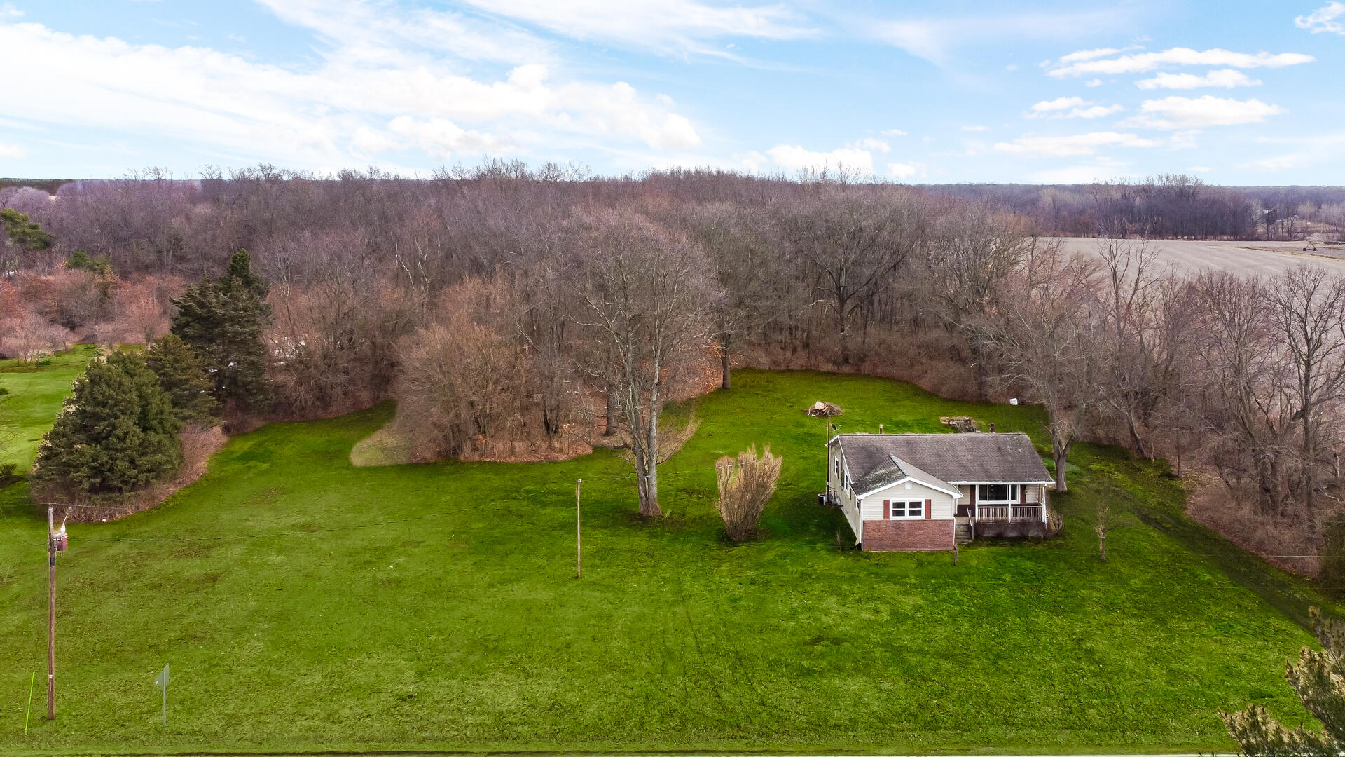 65720 Highway 4 Walkerton, IN 46574 - Photo 1 of 35 an aerial view of a house with garden