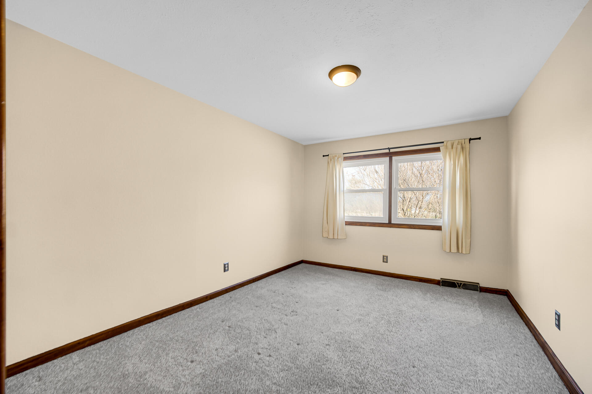 65720 Highway 4 Walkerton, IN 46574 - Photo 19 of 35 an empty room with windows
