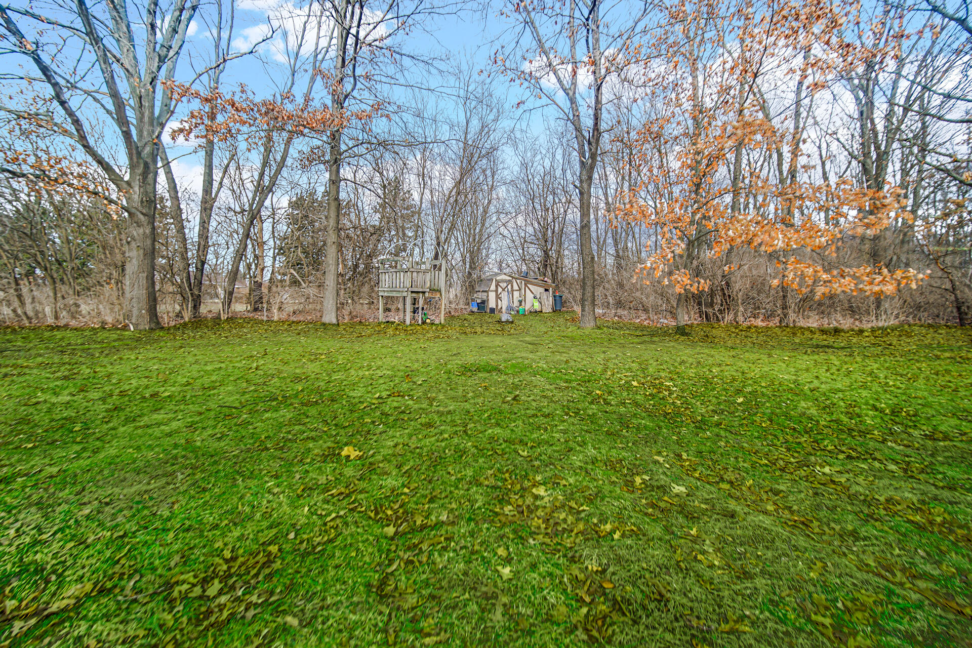 65720 Highway 4 Walkerton, IN 46574 - Photo 31 of 35 a backyard of a house with lots of green space
