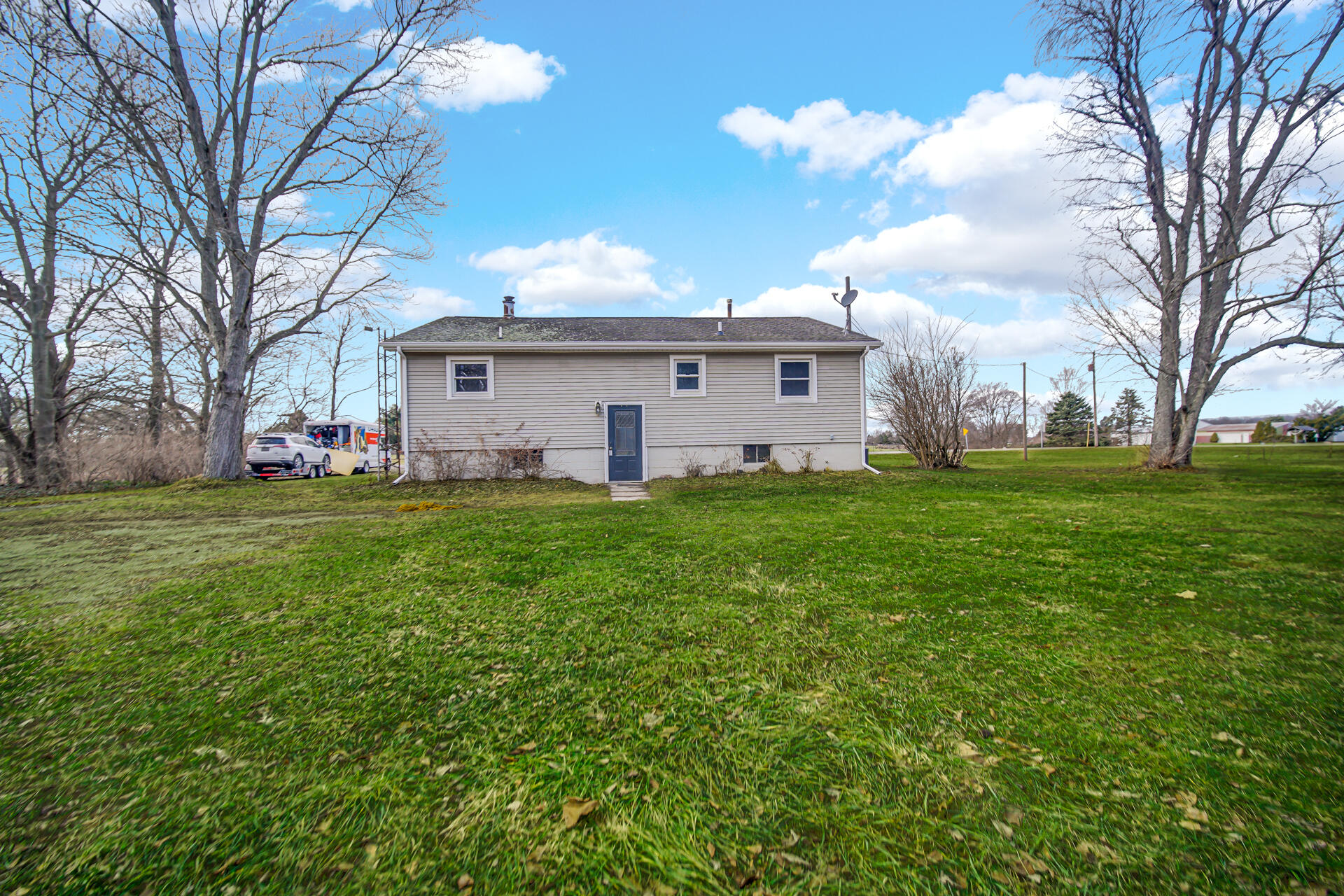 65720 Highway 4 Walkerton, IN 46574 - Photo 6 of 35 a view of a house with a yard