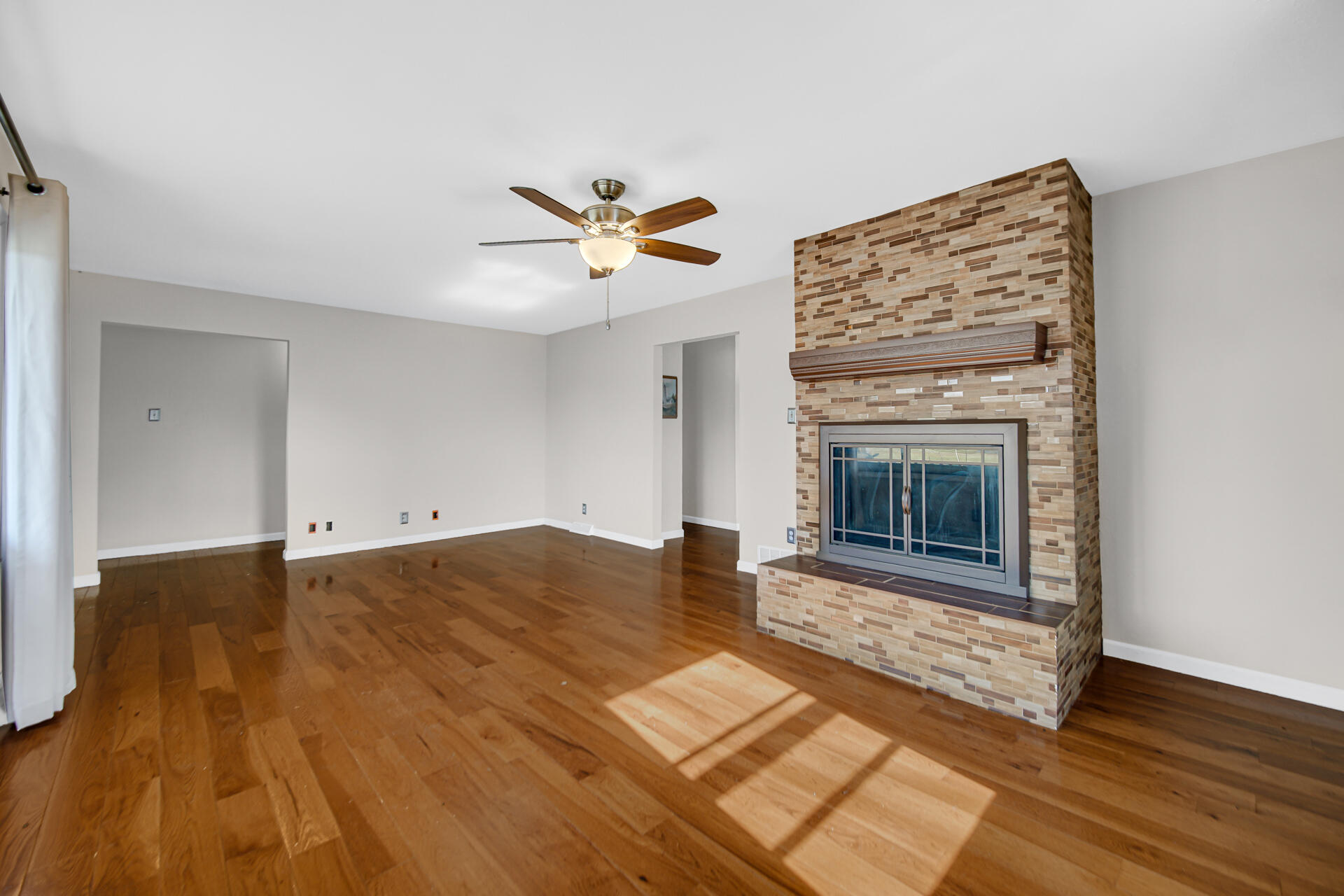 65720 Highway 4 Walkerton, IN 46574 - Photo 9 of 35 a bedroom with a bed and a fireplace