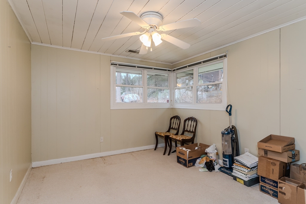 411 Forest Hills Road Springfield, MA 01128 - Photo 23 of 26 a view of a workspace with furniture and a window