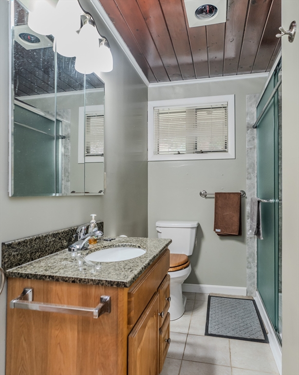 411 Forest Hills Road Springfield, MA 01128 - Photo 25 of 26 a bathroom with a granite countertop sink and a mirror