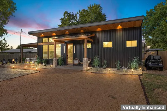 a view of a balcony with chairs