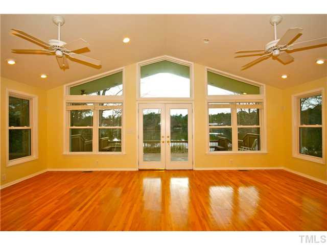 5412 Newhall Road Durham, NC 27713 - Photo 4 of 25 Family Room has unbelievable view of the water. Den/Family/Great Room