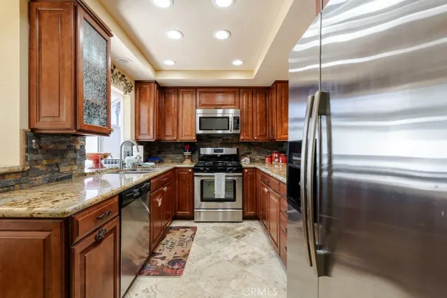 a bedroom with a bed and a closet