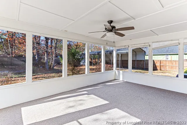 a view of a room with a large window