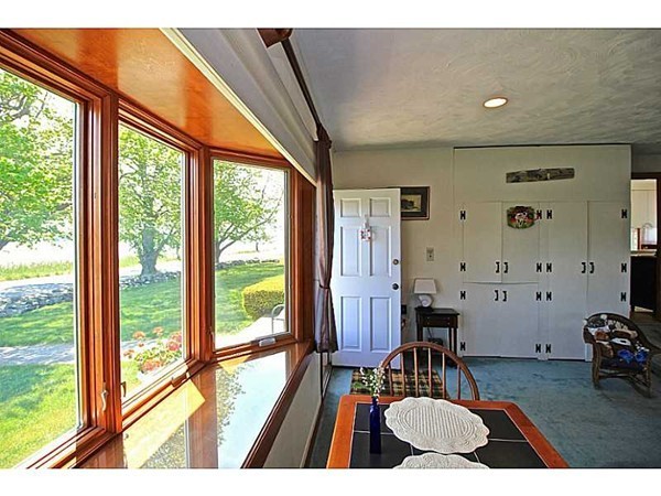 821 Pearse Road Swansea, MA 02777 - Photo 6 of 7 a room with furniture and a large window