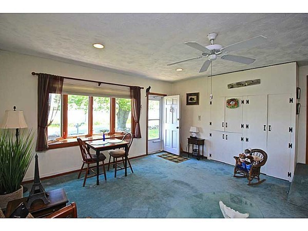 821 Pearse Road Swansea, MA 02777 - Photo 7 of 7 a living room with furniture and wooden floor