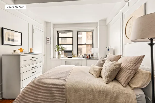 a picture of a bench in front of a building