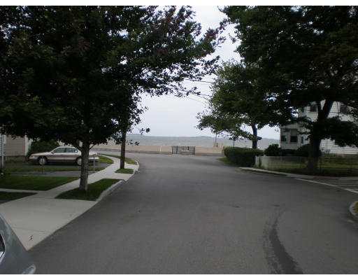 44 Chickatabot Road Quincy, MA 02169 - Photo 3 of 6 a view of a street with a tree