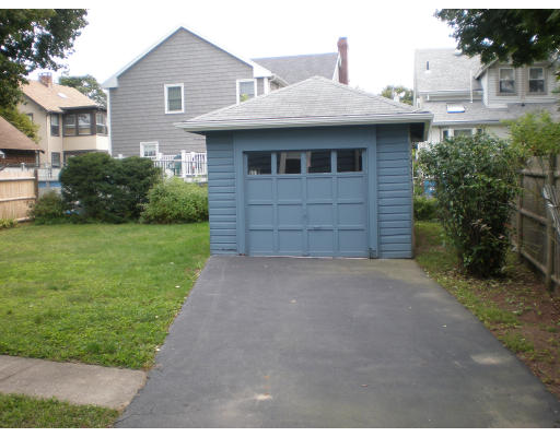 44 Chickatabot Road Quincy, MA 02169 - Photo 6 of 6 a front view of a house with a garden
