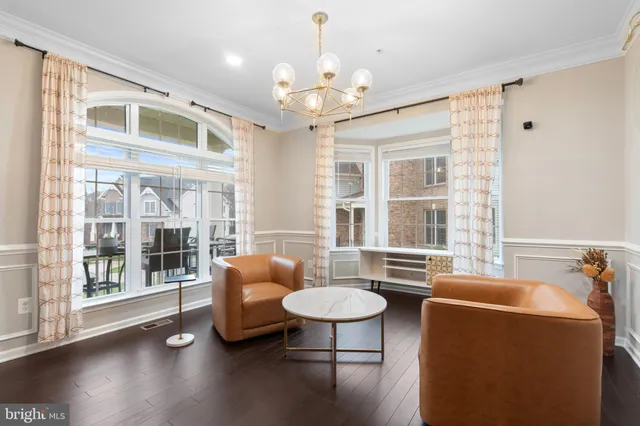 a view of entryway with stairs and wooden floor