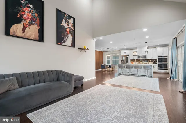a bathroom with a double vanity sink toilet and shower