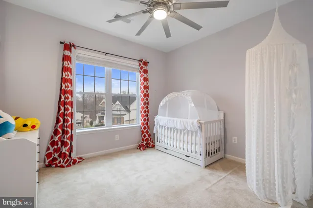 a view of a hallway with windows