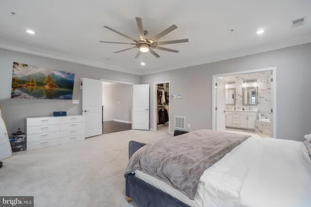 a workspace with wooden floor and a window