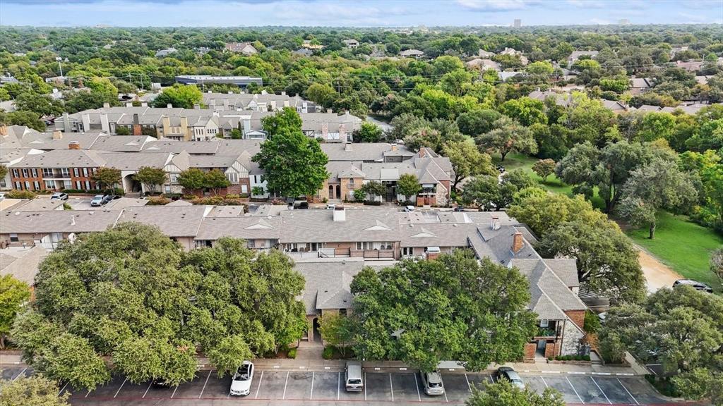 15914 Club Crest Drive, Unit 1112 Dallas, TX 75248 - Photo 12 of 35 an aerial view of multiple house with a yard