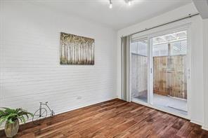 15914 Club Crest Drive, Unit 1112 Dallas, TX 75248 - Photo 27 of 35 a view of empty room with wooden floor