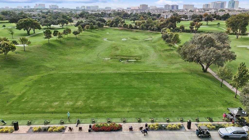 15914 Club Crest Drive, Unit 1112 Dallas, TX 75248 - Photo 4 of 35 an aerial view of a golf course with parking space