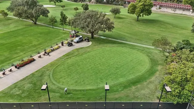 a aerial view of a house with a yard