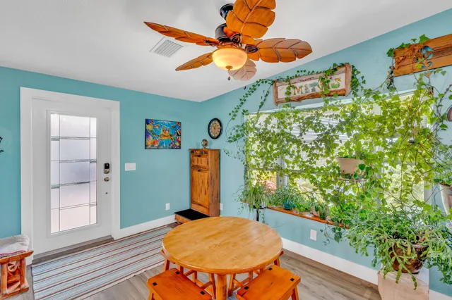 a kitchen with stainless steel appliances granite countertop a stove and refrigerator