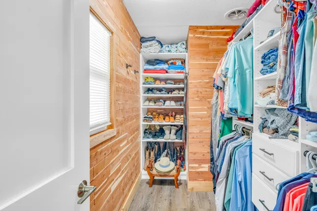 a kitchen with a refrigerator and a sink