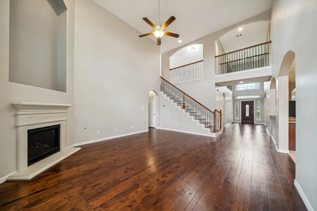 a large bathroom with a large tub and sink