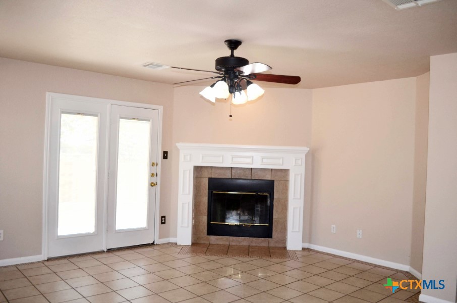 5406 Oster Drive Killeen, TX 76542 - Photo 16 of 46 a living room with furniture and a fireplace