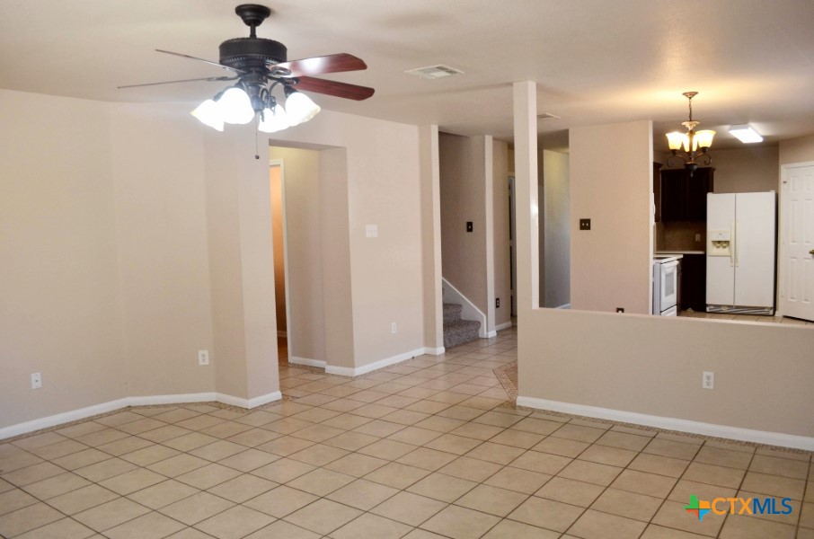 5406 Oster Drive Killeen, TX 76542 - Photo 17 of 46 a view of a hallway with a chandelier