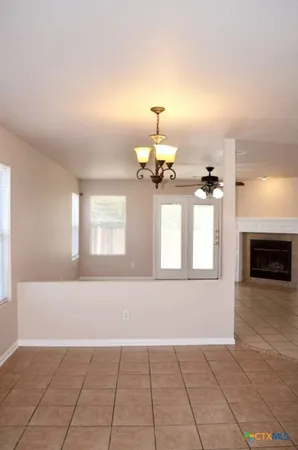 a view of a room with windows