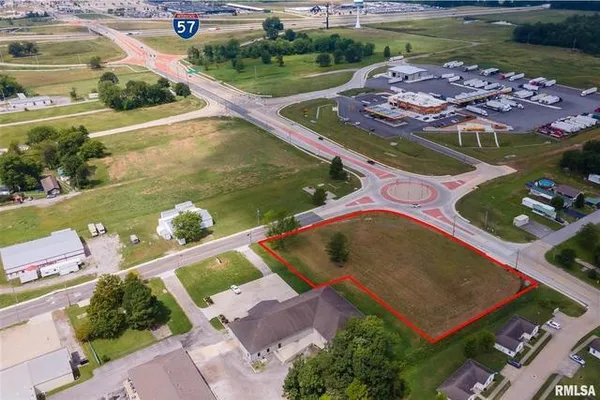 an aerial view of a house with outdoor space