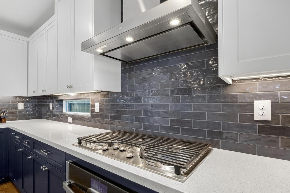 12086 Mircado Way Rancho Cordova, CA 95742 - Photo 21 of 84 a kitchen with granite countertop a stove and a sink