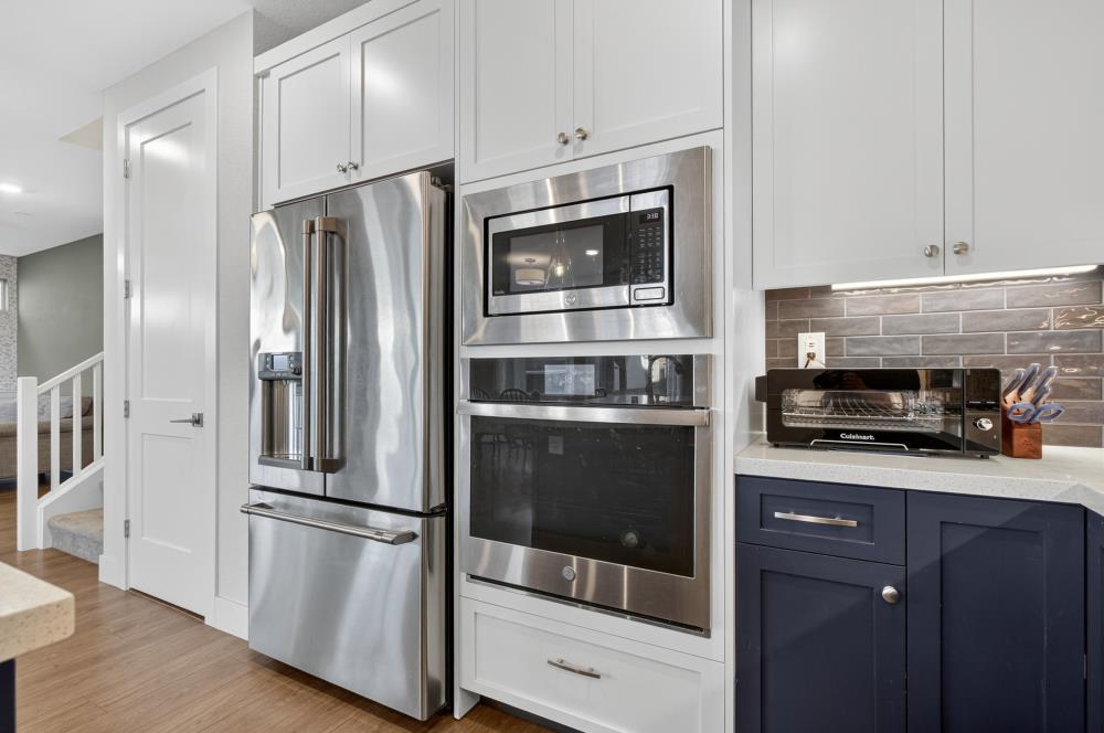 12086 Mircado Way Rancho Cordova, CA 95742 - Photo 24 of 84 a kitchen with stainless steel appliances and wooden cabinets