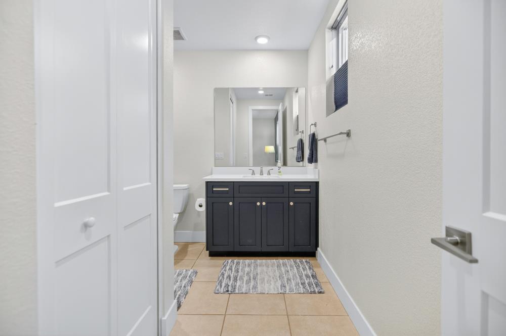 12086 Mircado Way Rancho Cordova, CA 95742 - Photo 40 of 84 a bathroom with a sink and a mirror