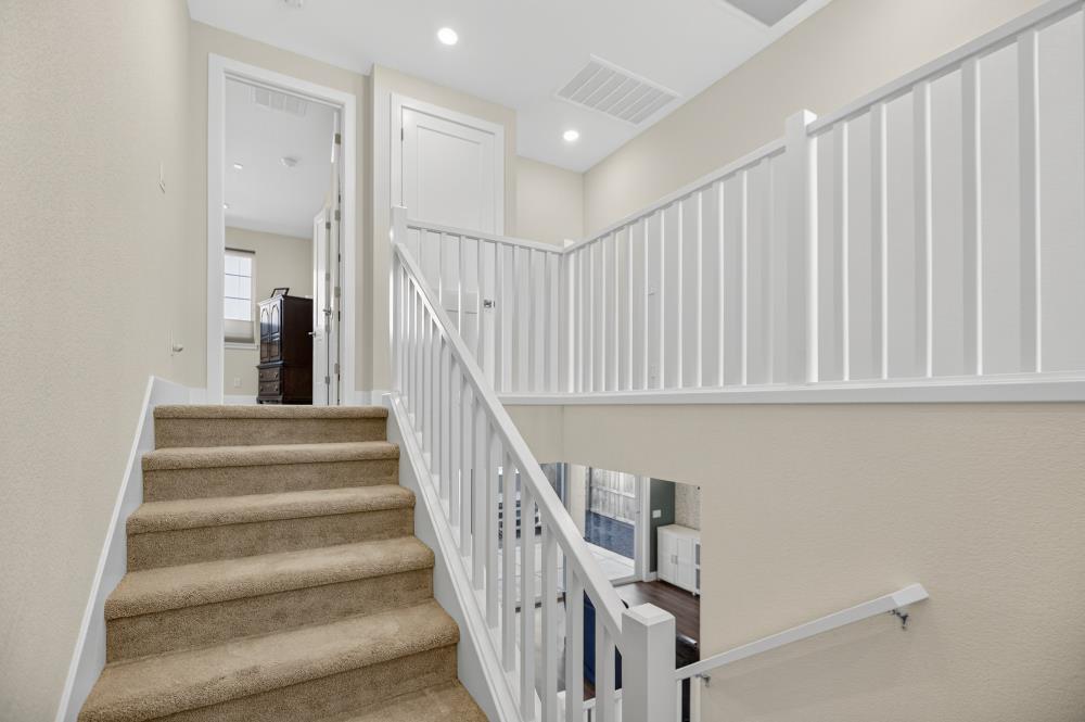 12086 Mircado Way Rancho Cordova, CA 95742 - Photo 44 of 84 a view of staircase with white walls and a window