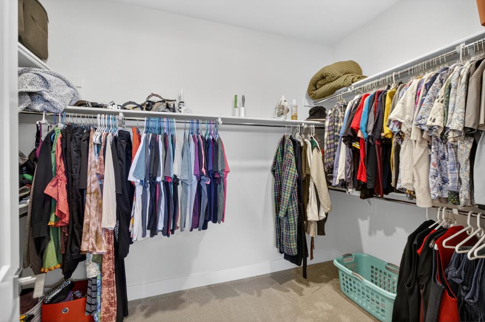 12086 Mircado Way Rancho Cordova, CA 95742 - Photo 46 of 84 a view of walk in closet with clothes