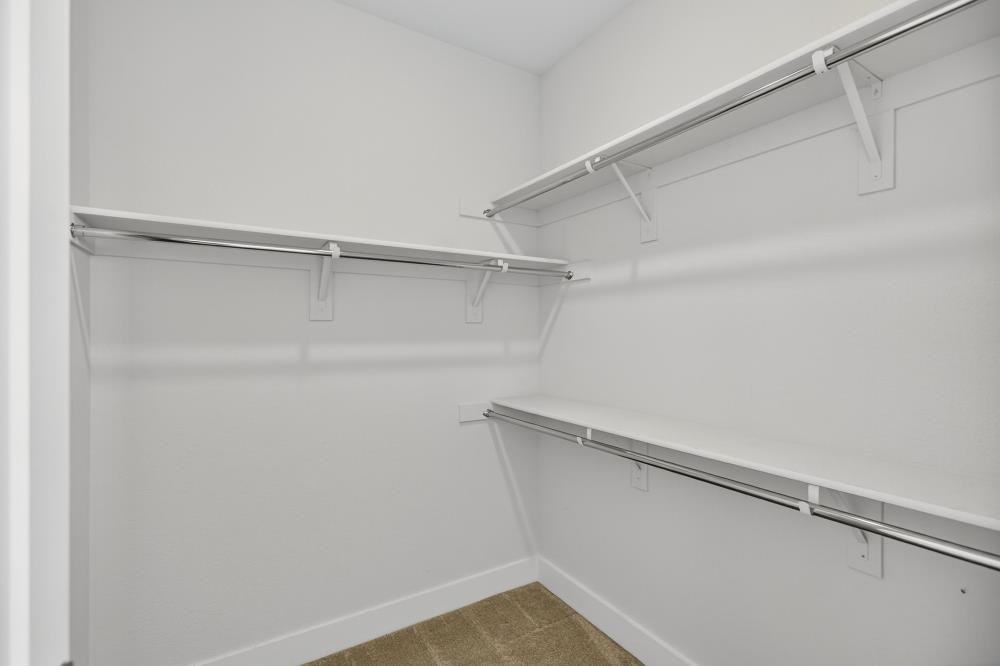 12086 Mircado Way Rancho Cordova, CA 95742 - Photo 50 of 84 a view of a room with racks on the wall