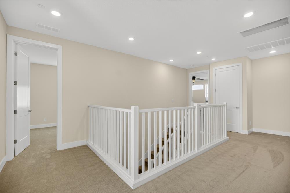12086 Mircado Way Rancho Cordova, CA 95742 - Photo 56 of 84 a view of a hallway with windows