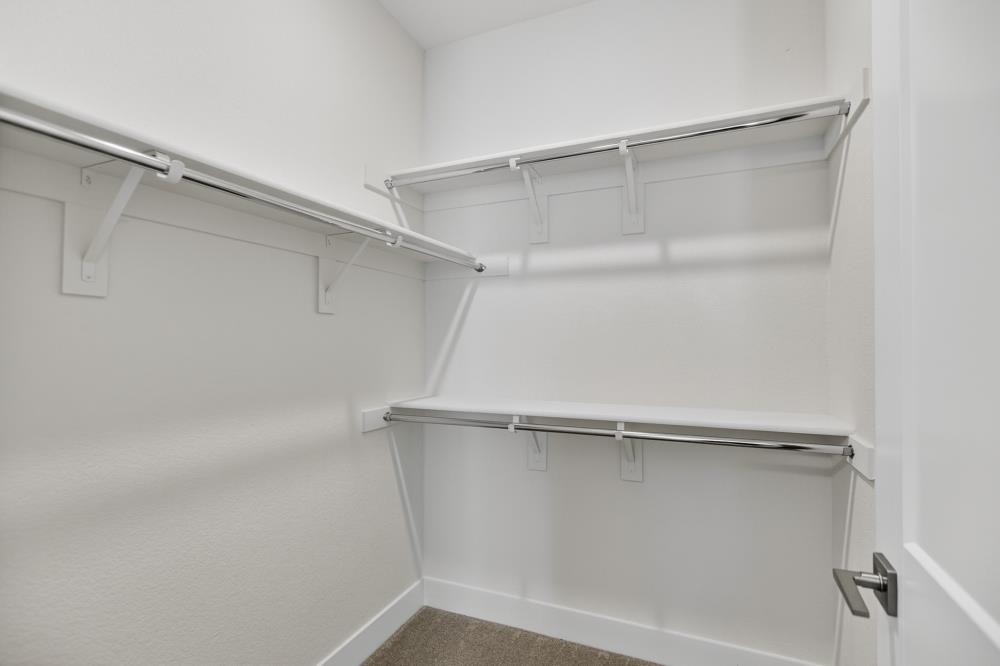 12086 Mircado Way Rancho Cordova, CA 95742 - Photo 59 of 84 a view of an empty walk in closet