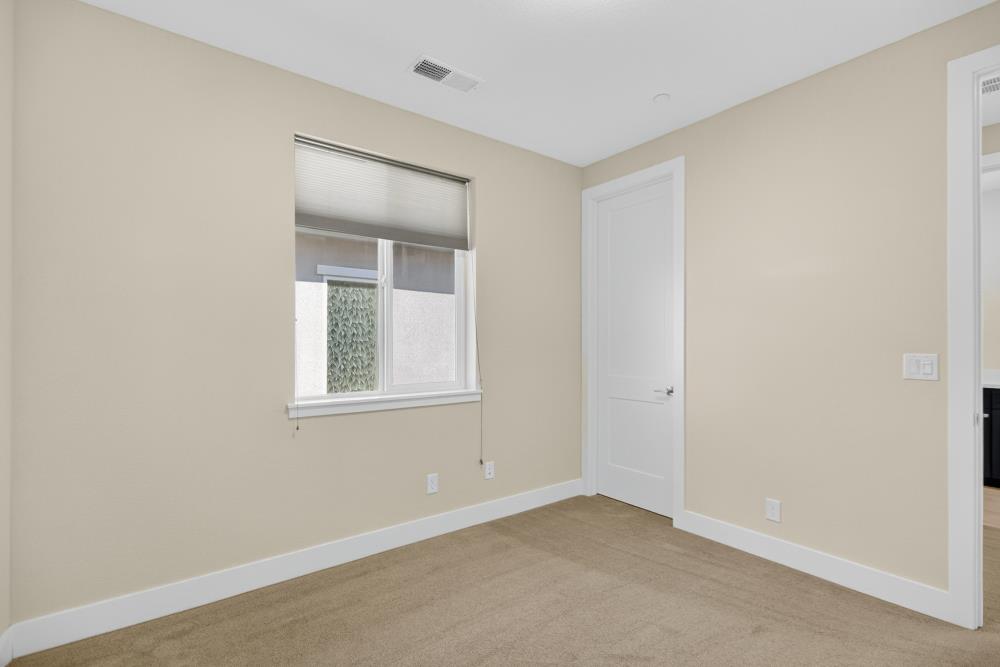 12086 Mircado Way Rancho Cordova, CA 95742 - Photo 65 of 84 an empty room with a window