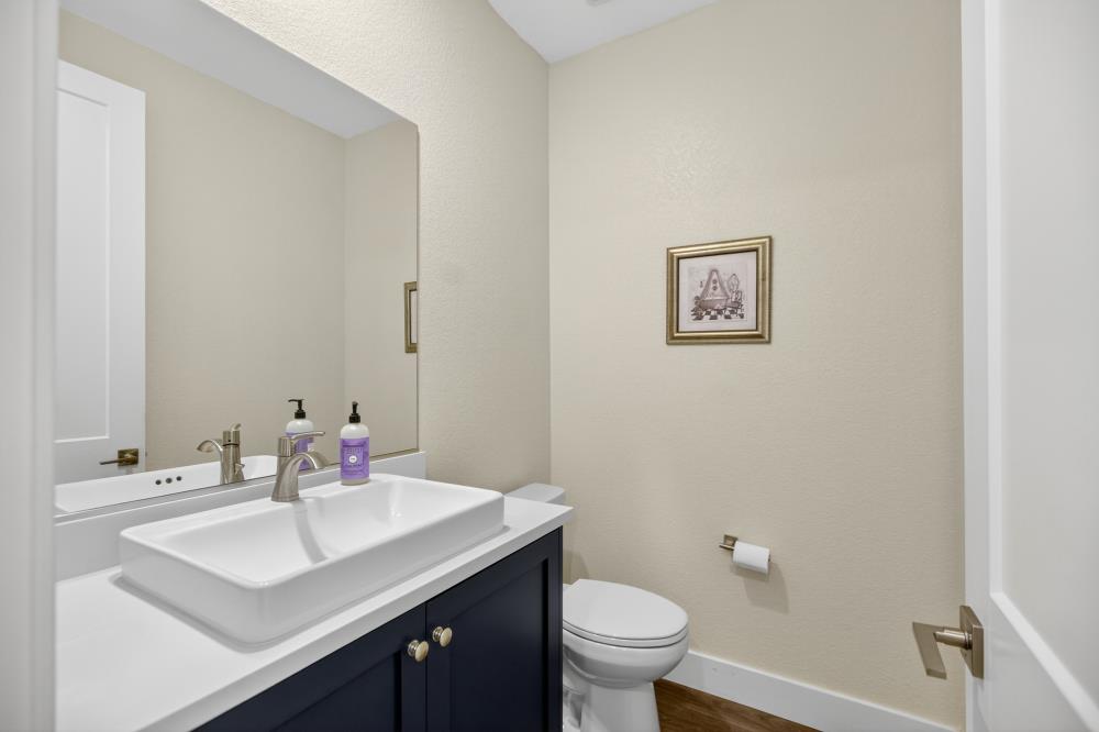 12086 Mircado Way Rancho Cordova, CA 95742 - Photo 10 of 84 a bathroom with a sink toilet and a mirror