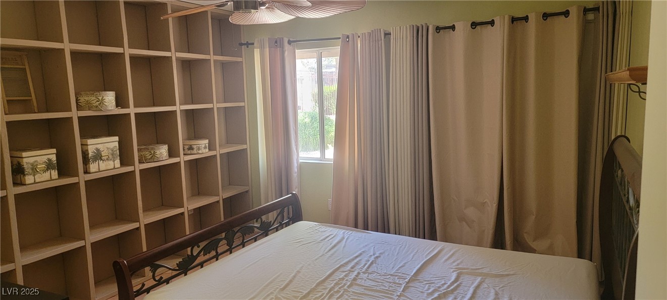 7885 West Flamingo Road, Unit 1010 Las Vegas, NV 89147 - Photo 20 of 32 Unfurnished bedroom featuring multiple windows