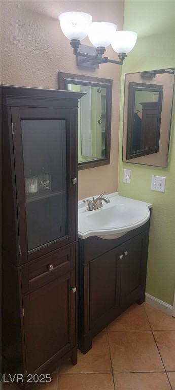 7885 West Flamingo Road, Unit 1010 Las Vegas, NV 89147 - Photo 22 of 32 Bathroom featuring vanity and tile patterned floor