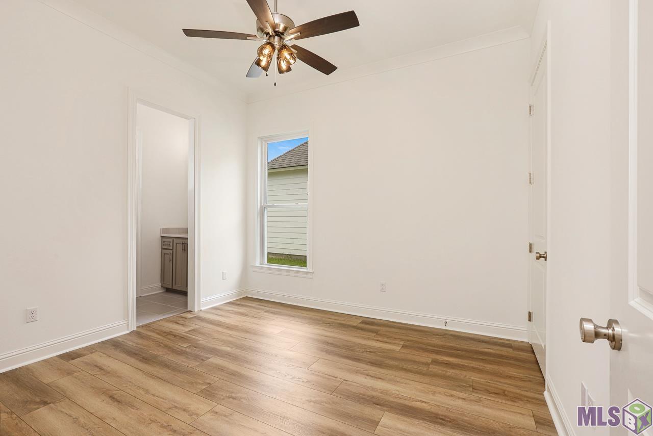 4451 Camargue Avenue Baton Rouge, LA 70820 - Photo 19 of 26 Guest Bedroom