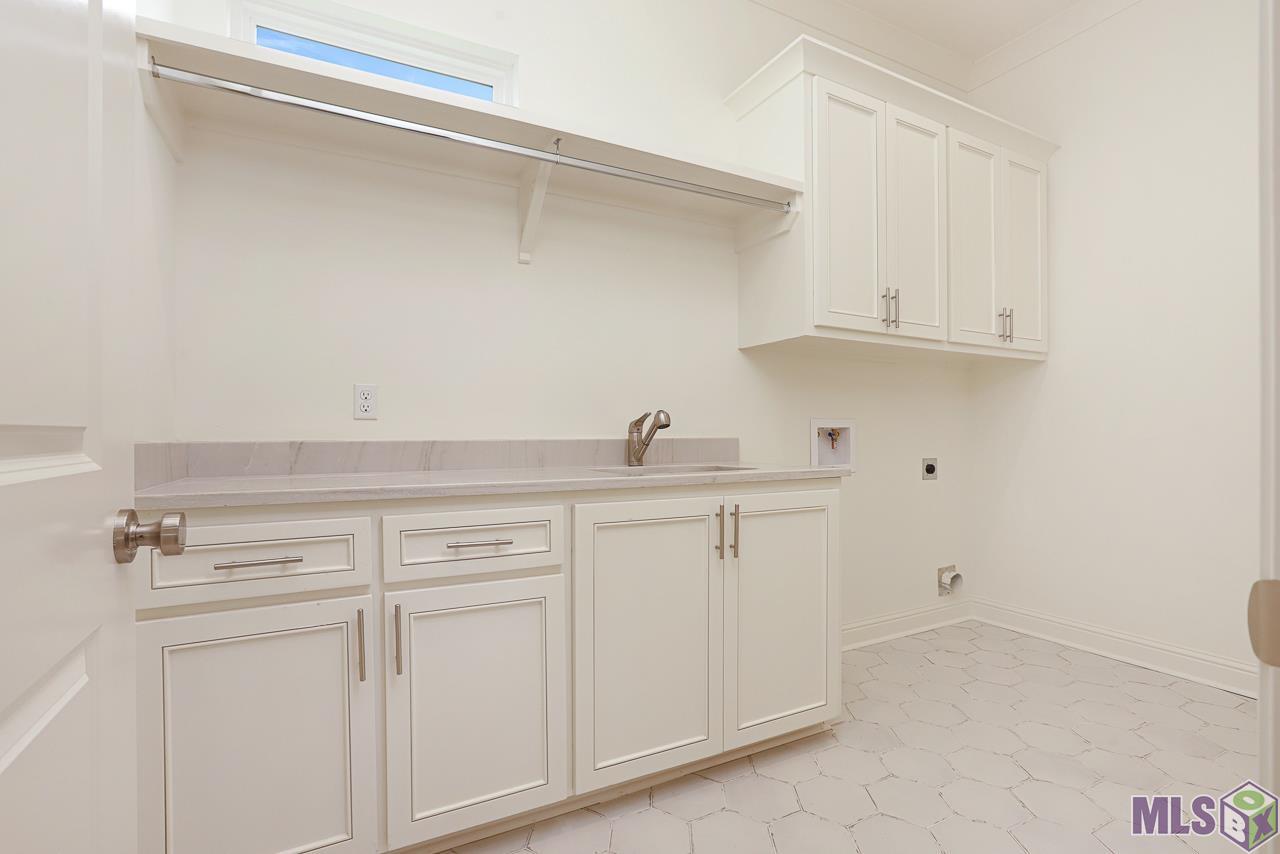 4451 Camargue Avenue Baton Rouge, LA 70820 - Photo 21 of 26 Laundry Room