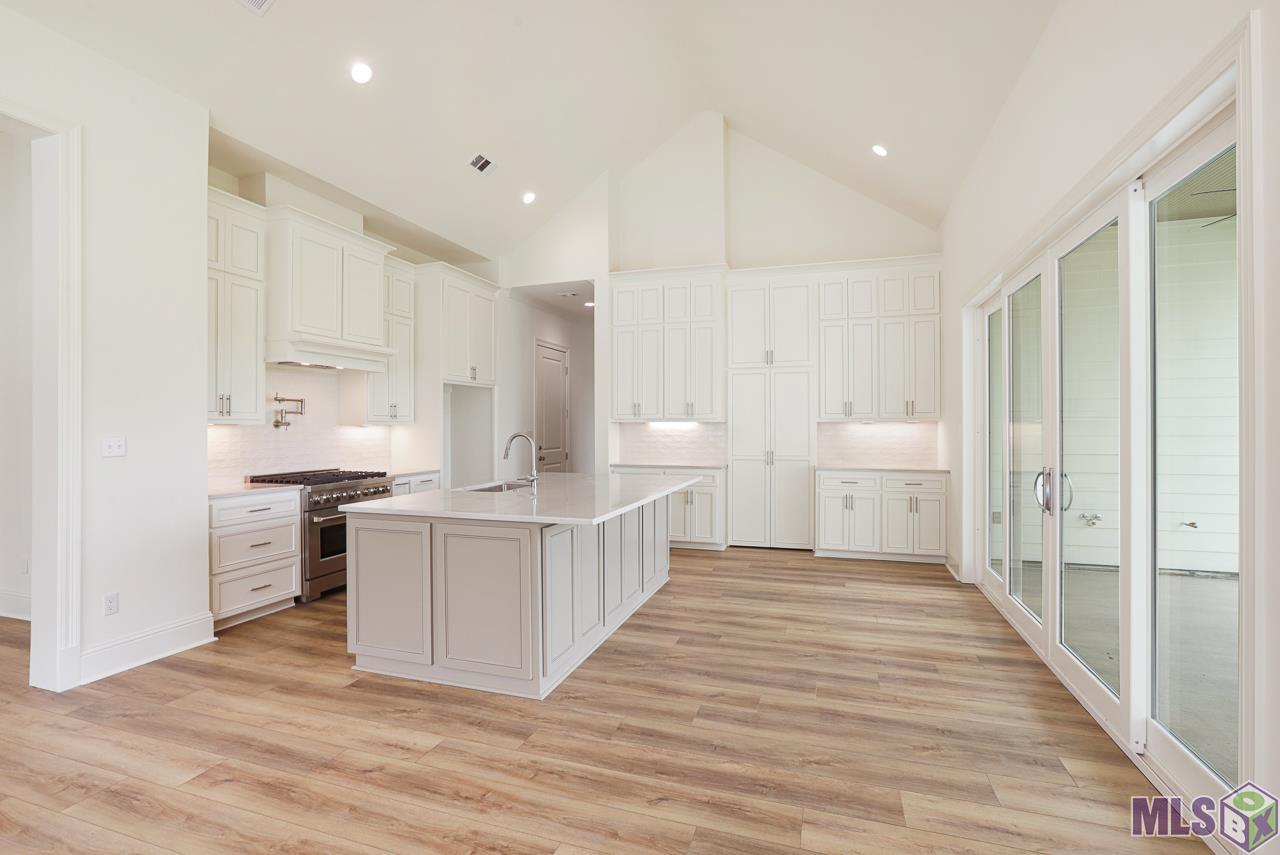 4451 Camargue Avenue Baton Rouge, LA 70820 - Photo 5 of 26 Can you find the Hidden Pantry?